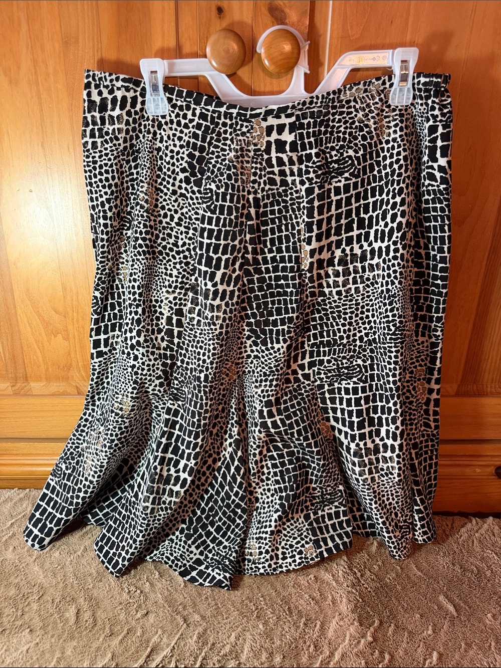 Skirt Size 12 - back zip. Elastic areas on sides. Fuller flare bottom.